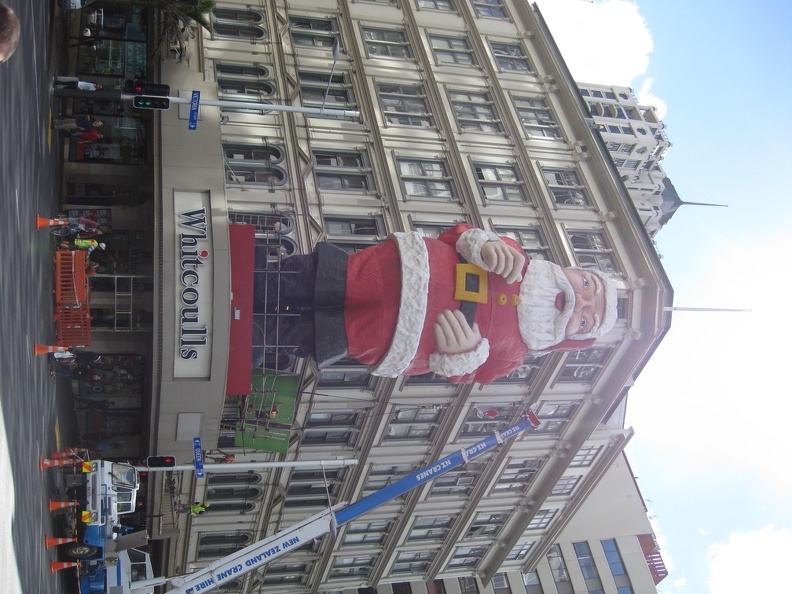 6 Whitcoulls Santa being erected - it_s only Nov 13.JPG